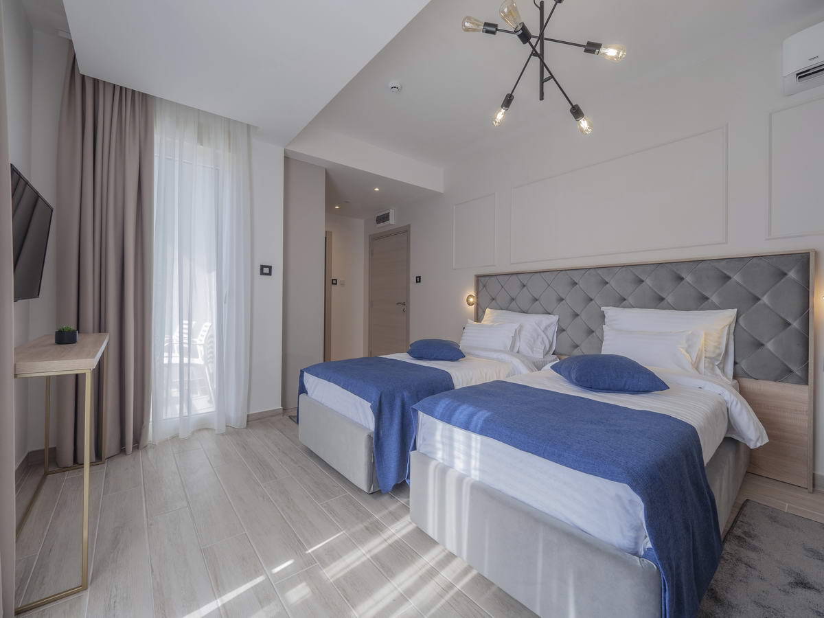 Hotel Idila - Улучшенный двухместный номер с 2 отдельными кроватями и видом на сад